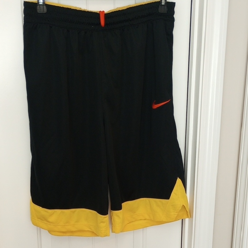 Nike Men's Black Shorts with Yellow Trim